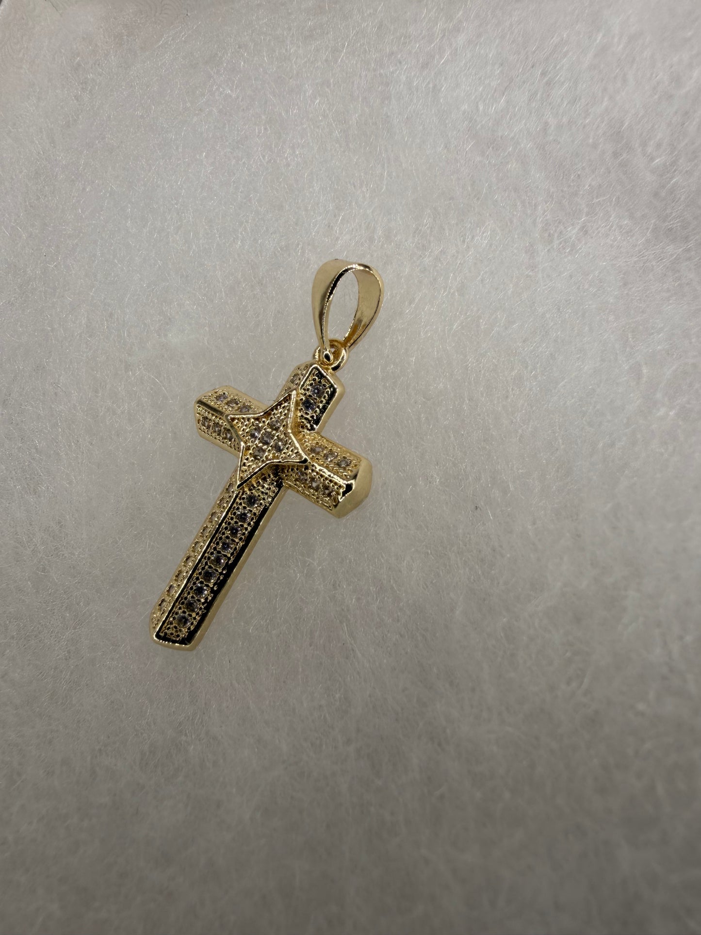 Cruz destello oscuro oro laminado 14k