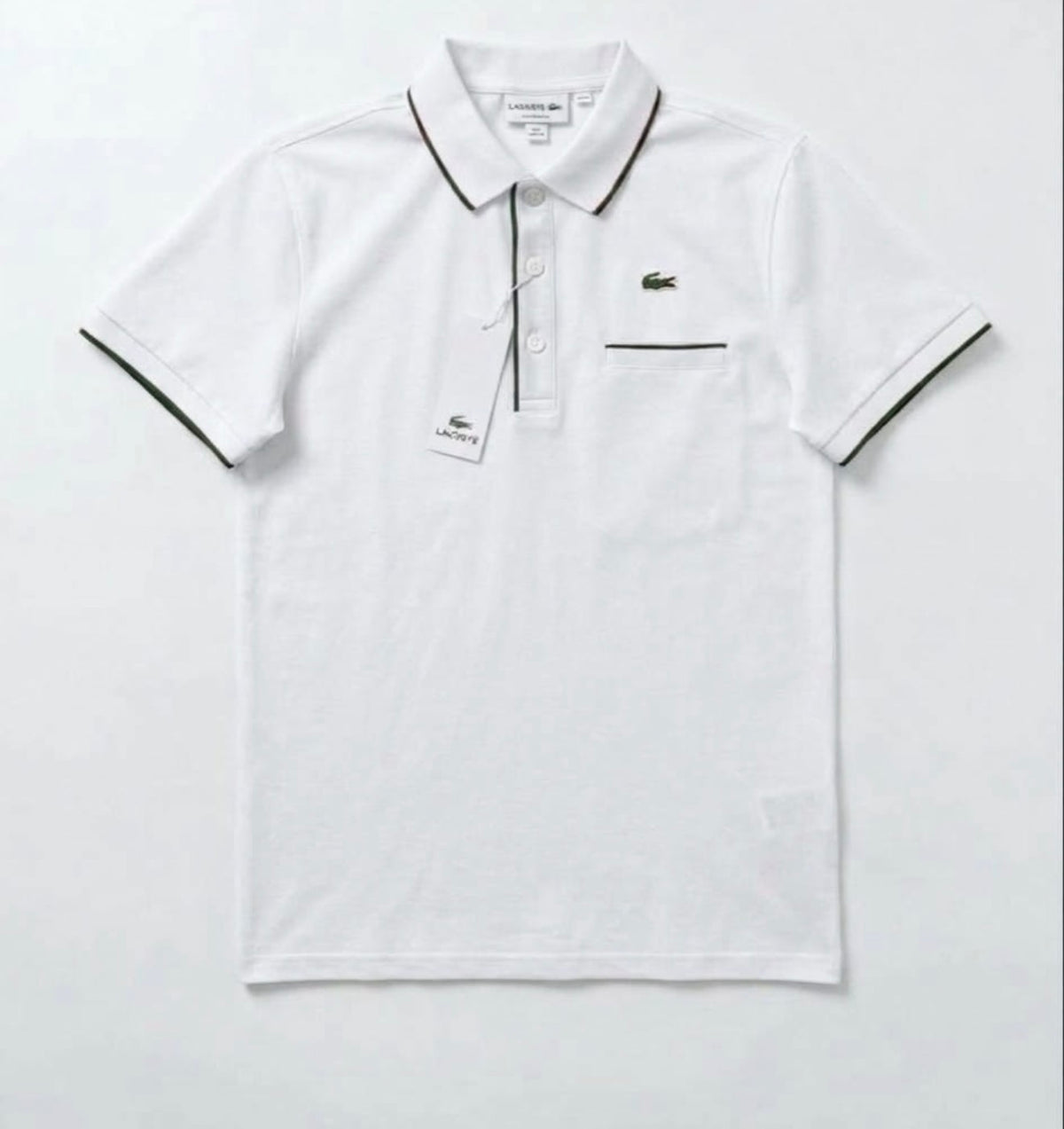 LACOSTE tipo polo bolsita blanca